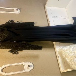 Lulus black floor length dress size medium. New with tags.